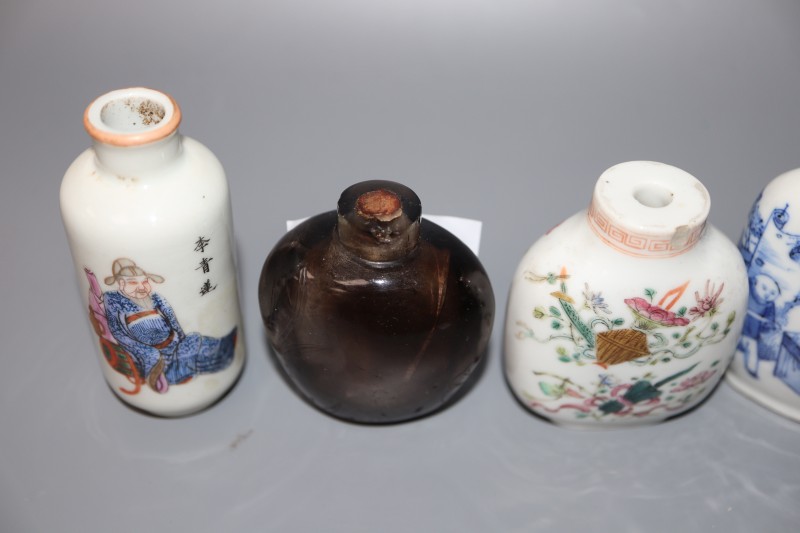 Five 19th century Chinese porcelain snuff bottles and a smoky quartz snuff bottle